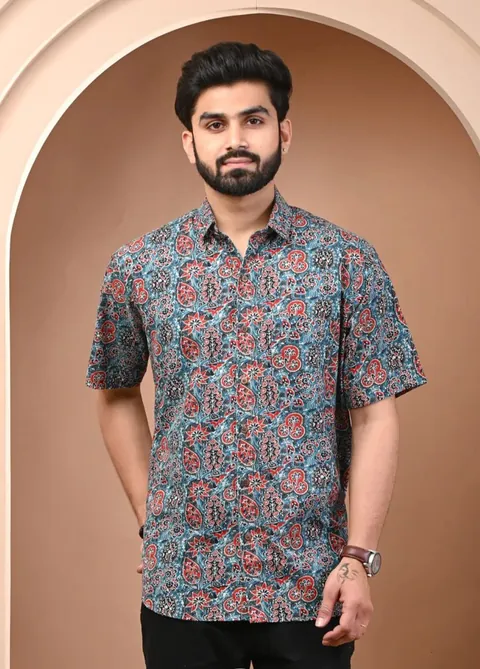 Man in the Teal Ajrakh Jaal shirt